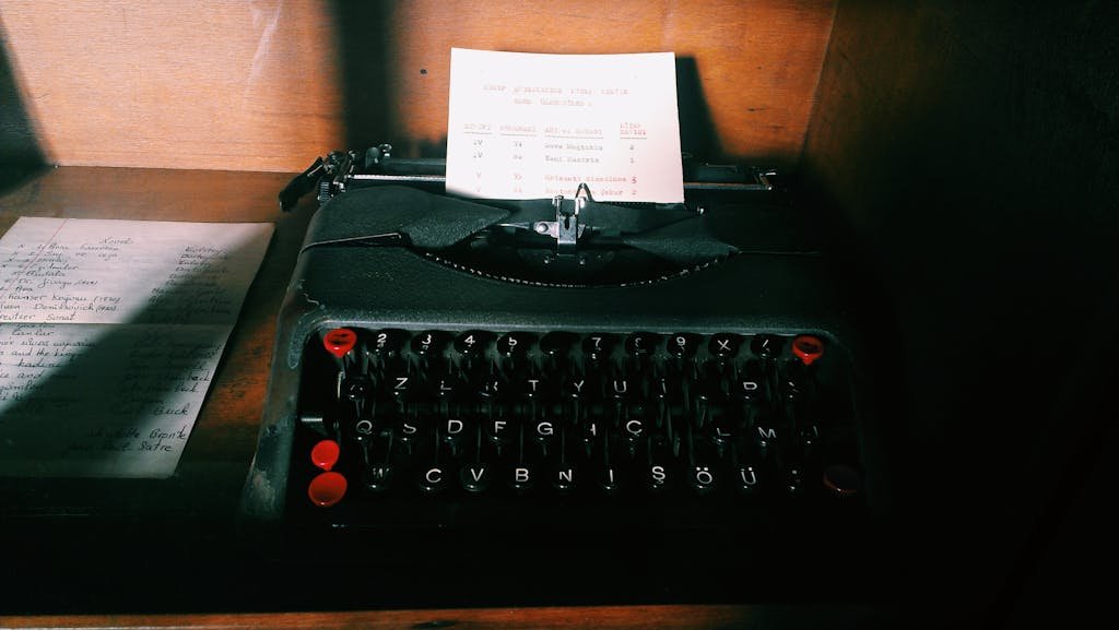 Classic vintage typewriter in an office setting with nostalgic lighting and retro vibe.