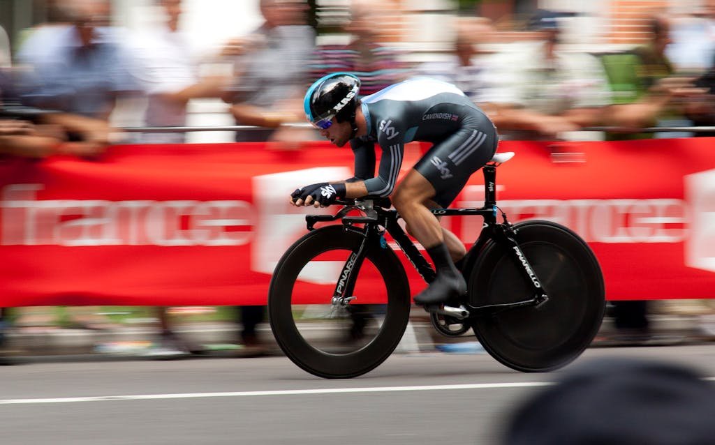 Site Speed Ecommerce Conversions. Man racing on a bike